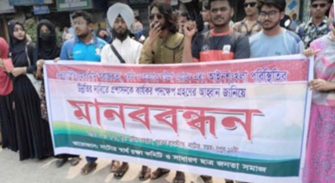 দেশব্যাপি চলমান ধর্ষণের ঘটনার প্রতিবাদে নাটোর স্বার্থ রক্ষা কমিটির মানববন্ধন অনুষ্ঠিত